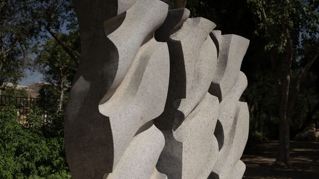 Tatsumi Sakai’s Door of Water (2023), an abstract stone sculpture with flowing curves and openings, installed at King Abdulaziz Historical Center (KAHC) in Riyadh, symbolizing the dynamic and transformative nature of water.