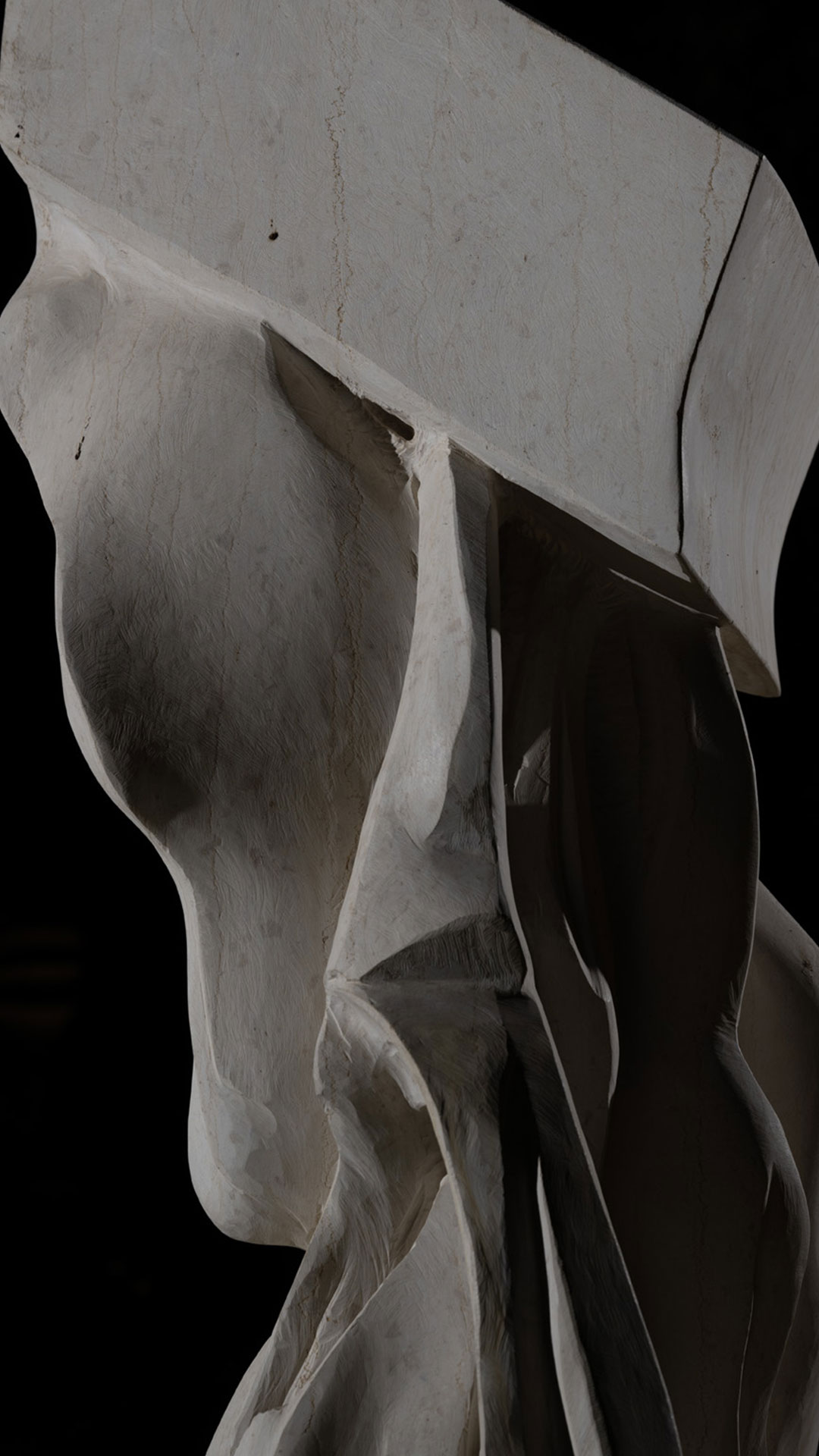 Energy of Water (2023) by Vasilisa Chugunova, a stone sculpture with intertwining lines and emerging droplets, installed at King Abdulaziz Historical Center (KAHC) in Riyadh, symbolizing the transformative power of water.