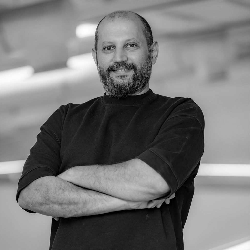 Portrait of Rashed AlShashai (b. 1977), Saudi contemporary artist and educator, known for conceptual installations using everyday objects to explore social transformation and cultural heritage.